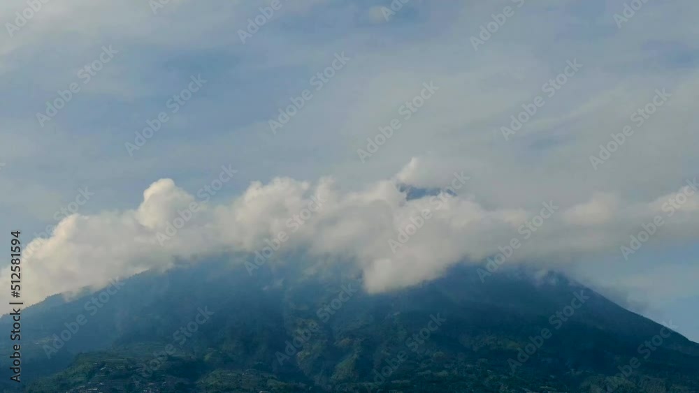 Cloud cover peak of volcano Mount Merapi on Java island, Indonesia, time lapse Cloud cover peak of volcano Mount Merapi on Java island, Indonesia, time lapse