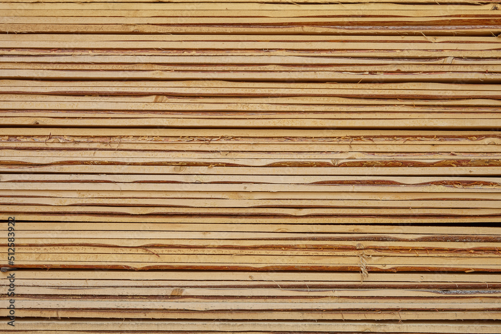 Edged board in stacks. Natural background. Texture. Edged board in stacks. Natural background. Texture.