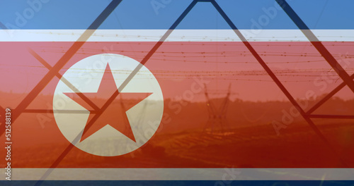 Image of flag of north korea over pylons