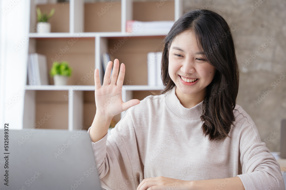 Young business women working and greeting on video conference with happy and smile face on office spec. Young business women working and greeting on video conference with happy and smile face on office spec.