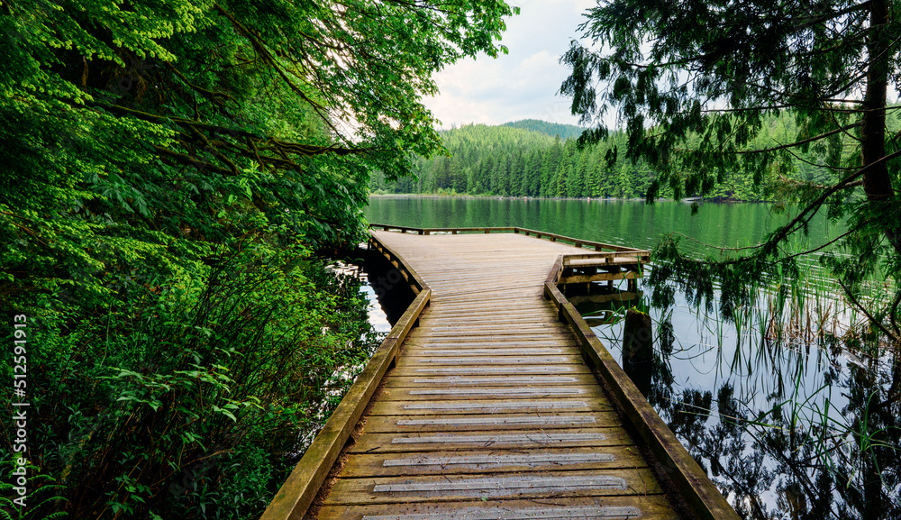 Wooden observation platform on Sasamat Lake, Belcarra Regional Park, BC, accessed from Sasamat Loop forest trail.
