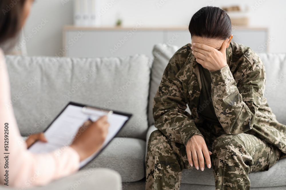 Psychotherapy With Veterans. Depressed Female Soldier Having Counselling Meeting With Psychiatrist