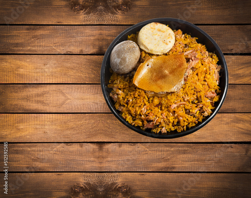 Typical tolimense lechona with rice - Typical Colombian dish photo