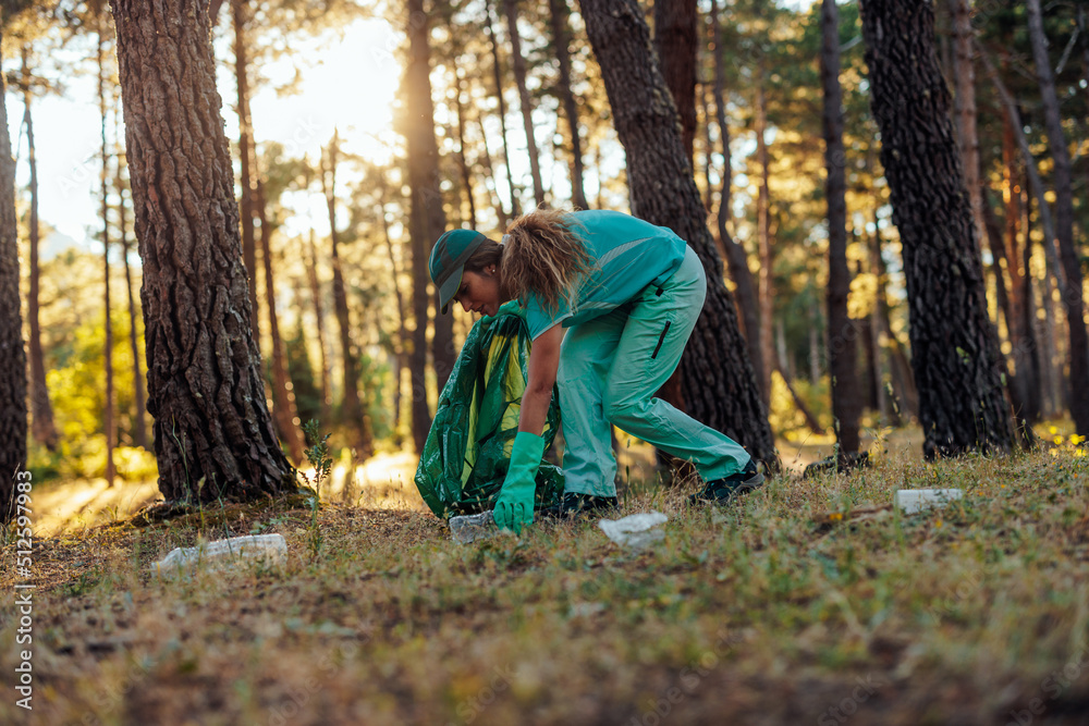 Young activist cleaning woods