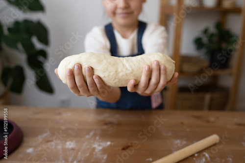 Girl Holding A Finished Clean Dough