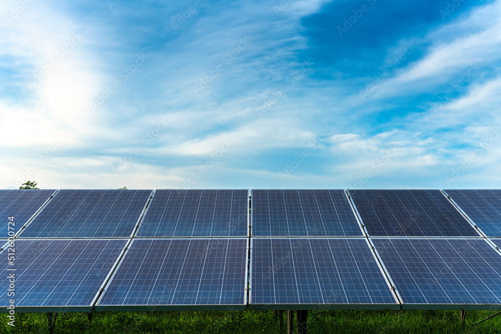 photovoltaic solar power panel on dramatic sunset blue sky background, green clean Alternative power energy concept. photovoltaic solar power panel on dramatic sunset blue sky background, green clean Alternative power energy concept.