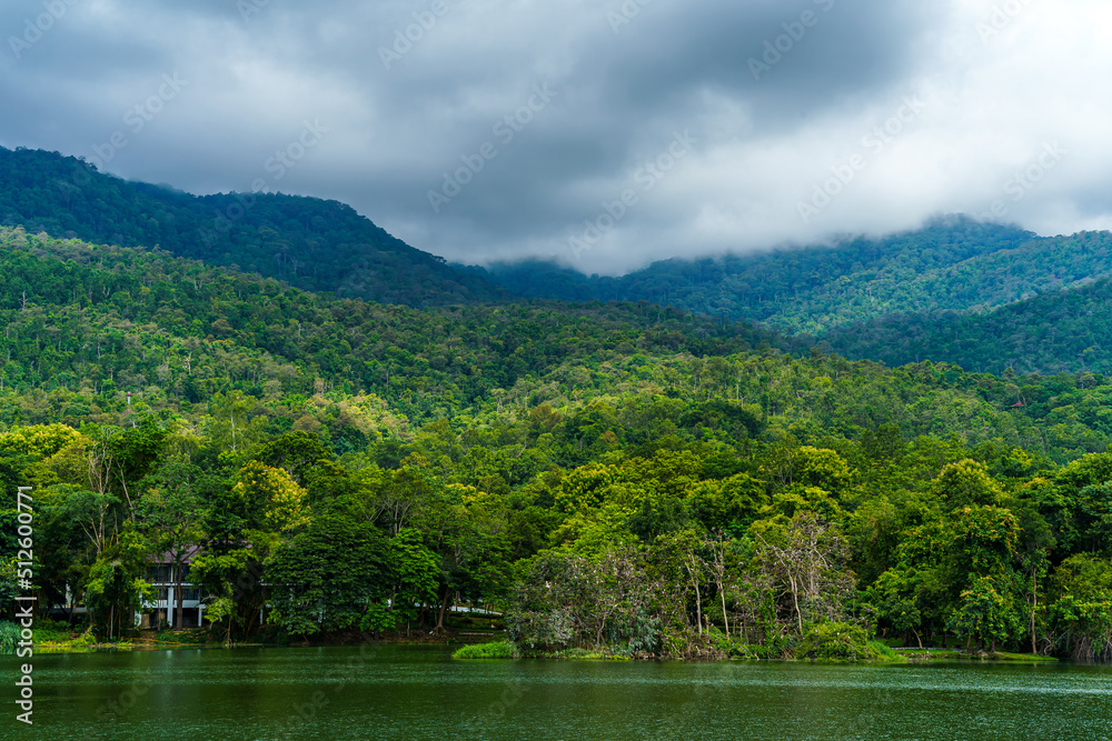 a public place leisure travel landscape lake views at Ang Kaew Chiang Mai University and Doi Suthep nature forest Mountain views spring cloudy sky background with white cloud.