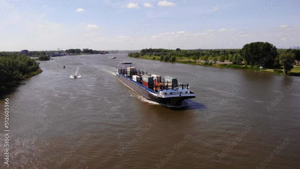 Missouri Container Ship Sailing On Oude Maas River Near Zwijndrecht, Netherlands. Aerial Wide Shot Missouri Container Ship Sailing On Oude Maas River Near Zwijndrecht, Netherlands. Aerial Wide Shot