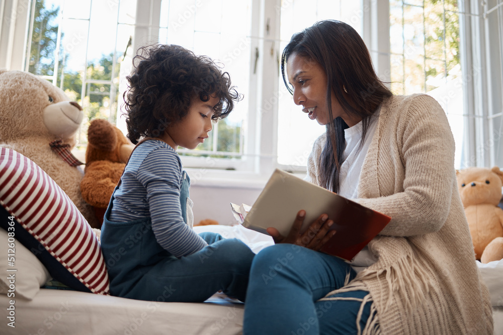 Everyones calling rings differently. Shot of a young woman spending quality time with her adorable child at home. Everyones calling rings differently. Shot of a young woman spending quality time with her adorable child at home.