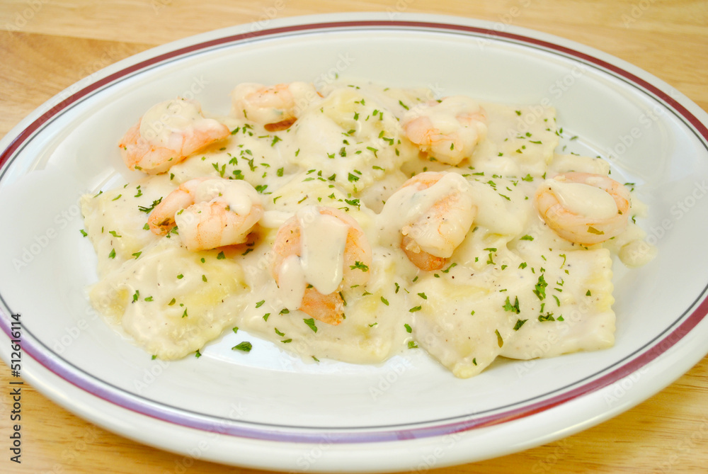 Shrimp Ravioli with a Parmesan Alfredo Sauce Shrimp Ravioli with a Parmesan Alfredo Sauce