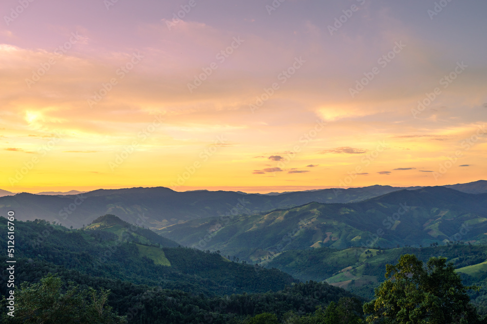 Beautiful sunset scenic with light shade into the mountain