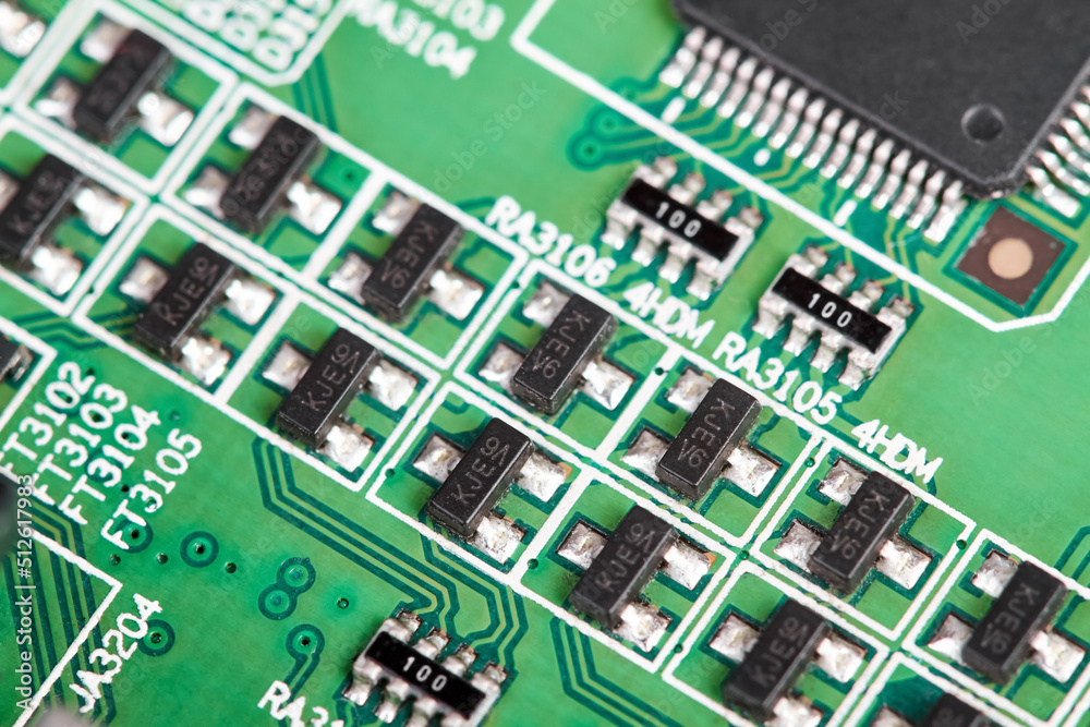 Close-up of a green computer printed circuit board with chips Close-up of a green computer printed circuit board with chips