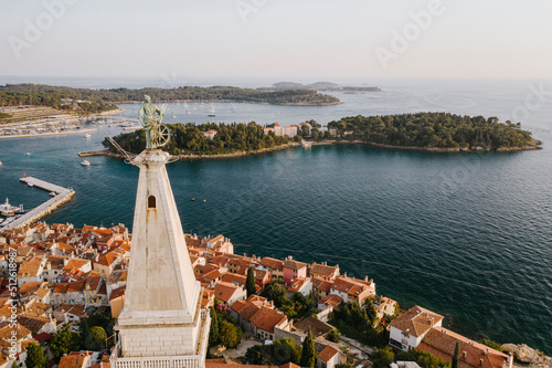 Fototapeta Naklejka Na Ścianę i Meble -  Aerial view of the old town of Rovinj with Church of Saint Euphemia on the Mediterranean sea , Rovinj, Croatia