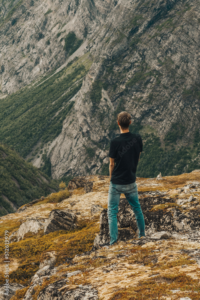 hiker on the top of mountain