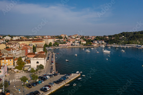 Fototapeta Naklejka Na Ścianę i Meble -  Aerial view of the coastline of Rovinj old city with the old port of Rovinj in summer, Croatia