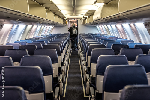 Last passenger leaving a plane on arrival