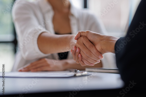 Tableau sur toile Business man offer and give hand for handshake in office