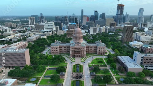 Austin Texas skyline and state capitol building. Aerial pullback reveal establishing shot. photo