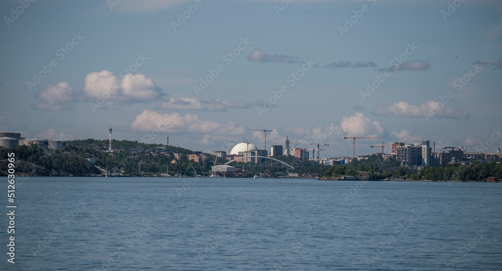 View over the central water way from the archipelago, sky scrapers, the glob Globen, Avicii arena, a summer day in Stockholm