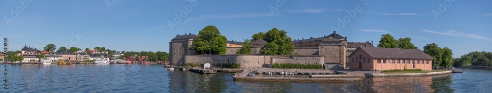 Panorama view over the bay with old fortress and the archipelago town Vaxholm a summer day in Stockholm