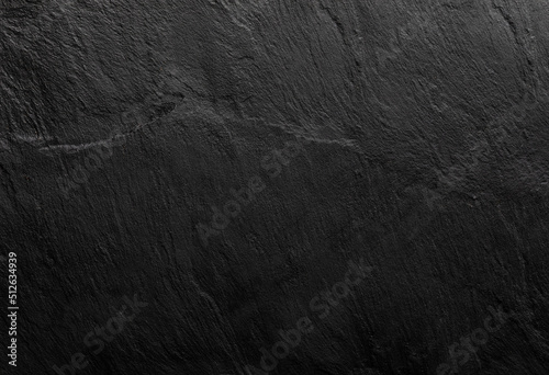 Abstract dark texture. Dirty wall background or wallpaper with copy space. Grunge dark texture with scratches. Distressed black grunge seamless texture. Overlay scratched backdrop 
