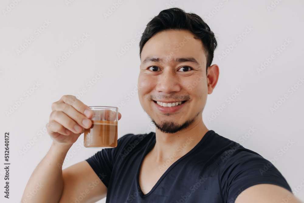 Happy face asian man test and proud of his coffee.