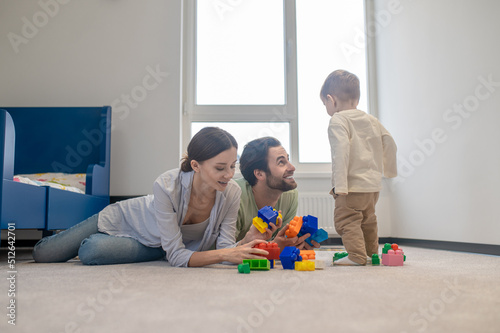 Family playing together and looking happy