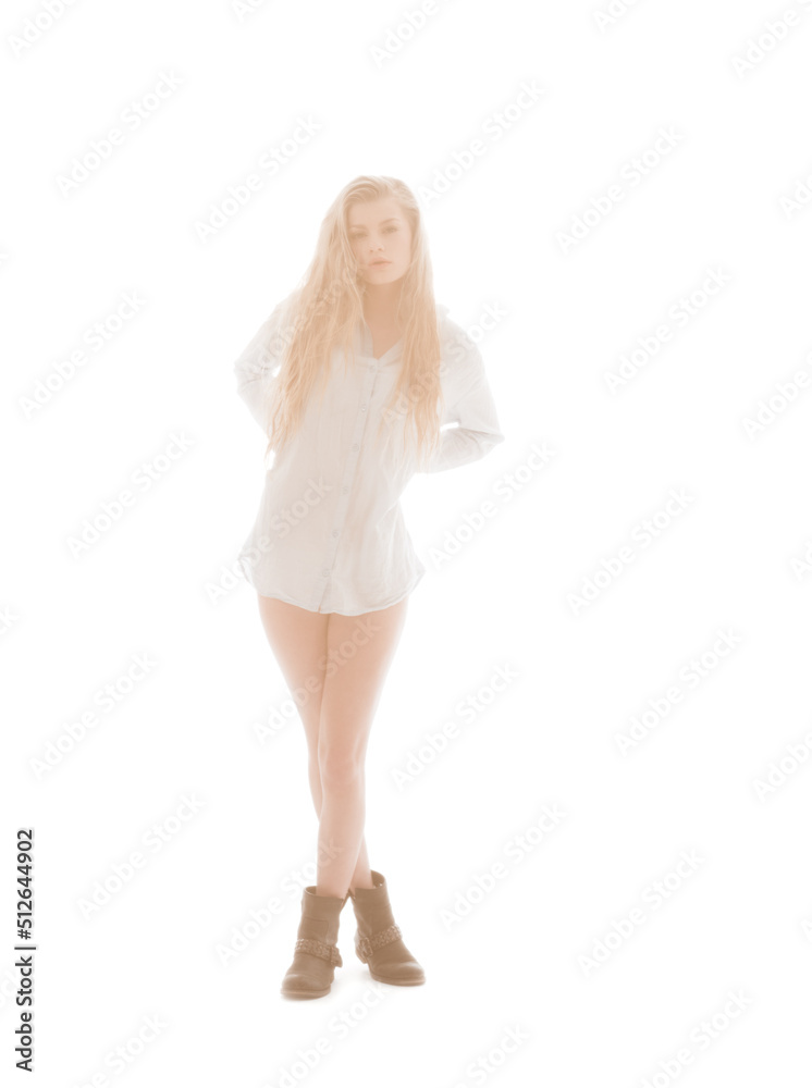 Bathed in white light. An ethereal beauty bathed in white light wearing a long sleepshirt.
