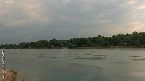 Time-lapse of Idroscalo lake park, canoes at the Idroscalo Park in Milan at overcast summer day photo