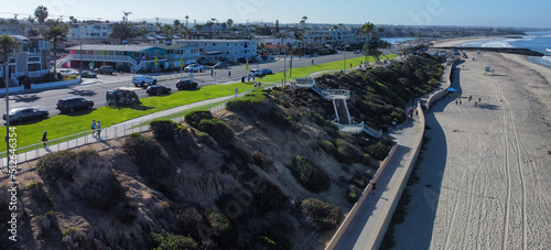 A view of the Carlsbad, California, Cliffs and Downtown, showing the Recreation Path and the Beach photo
