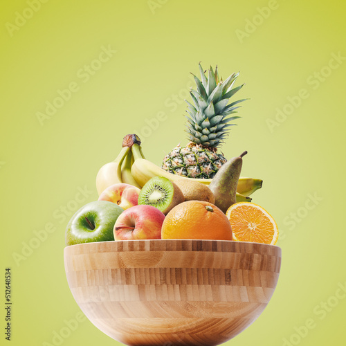 Wooden bowl full of fresh fruit