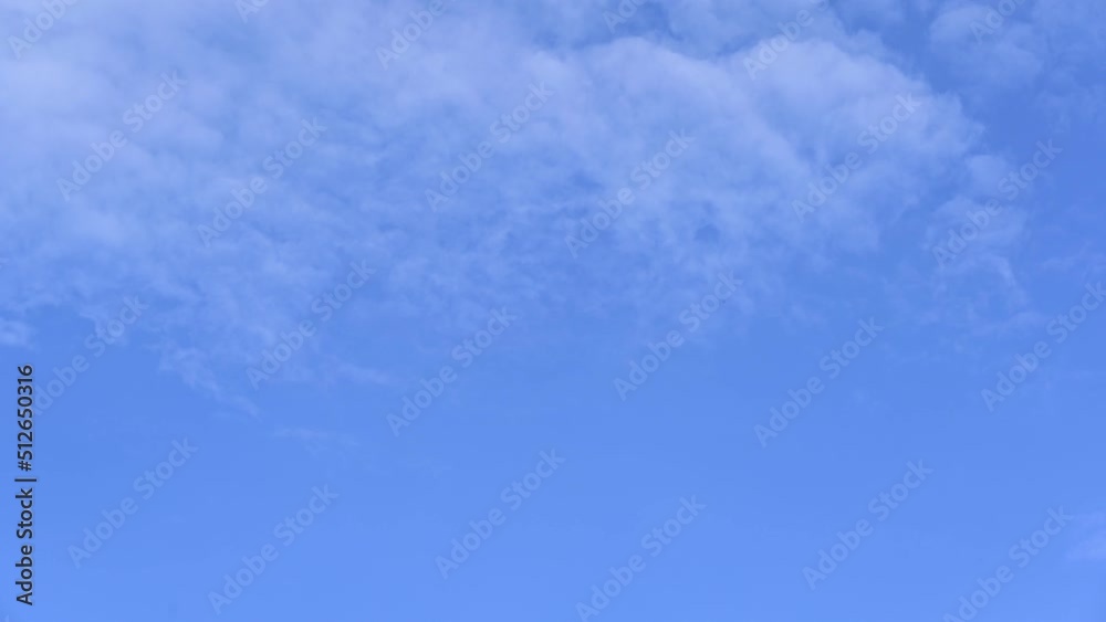 blue sky with clouds timelape of dramatic fast moving white clouds on beautiful sunny blue sky blue sky with clouds timelape of dramatic fast moving white clouds on beautiful sunny blue sky