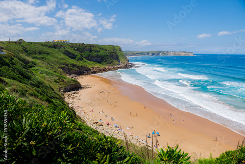 Beatiful ocean coast in summer day. Spain, suburb of Suances, summer day in the Province of Cantabria, it is photographed from Playa de Los Locos photo