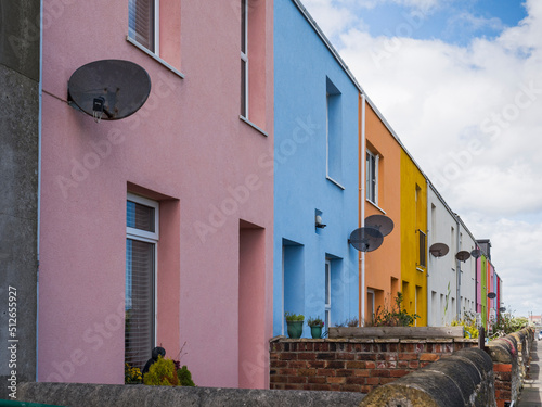 Brightly coloured houses at Cambois, Northumberland, UK photo