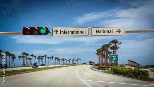 Street Sign to International versus National photo