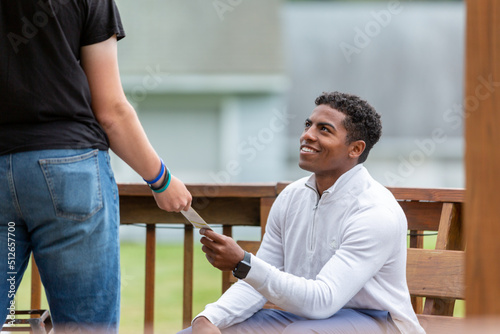 Man receiving a gospel tract photo