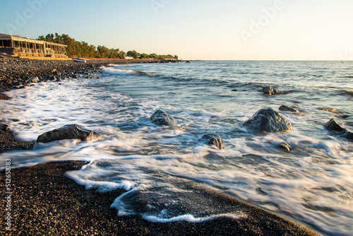 Fototapeta Naklejka Na Ścianę i Meble -  Kamari Black Sand Beach, Coast of Santorini