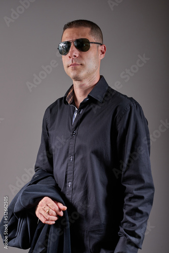 A young man in a black shirt