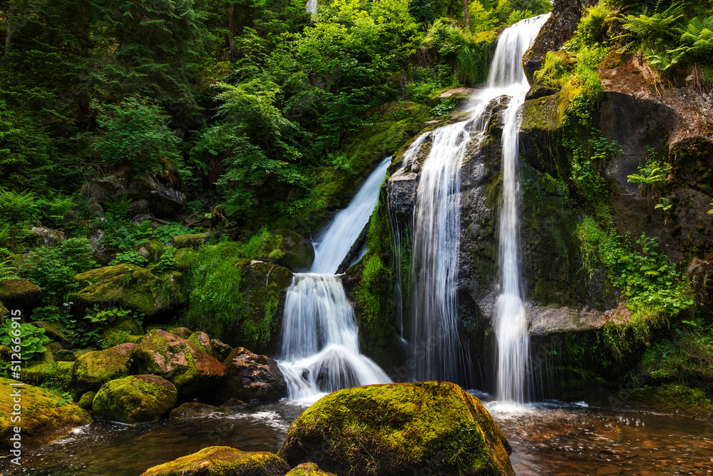Obraz premium Cascade waterfalls in Schwarzwald. Travel in Germany.