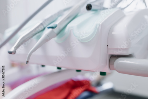  Modern dental office. Equipment with tools for dental treatment. Dental clinic. Close up