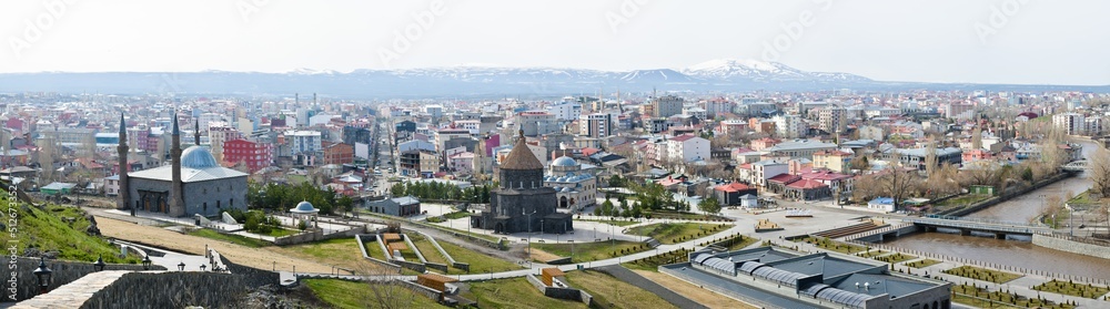 Aerial view Kars city panorama buildings with buildings and mountains background. Travel holidays in Kars