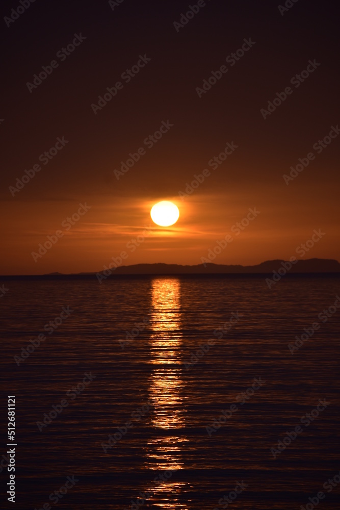 Beautiful sunset from Arillas beach in Corfu,Greece