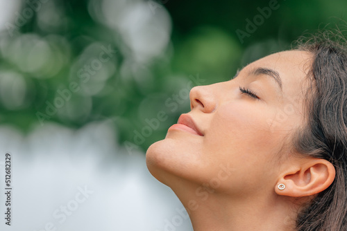 portrait of girl breathing calmly in the open air