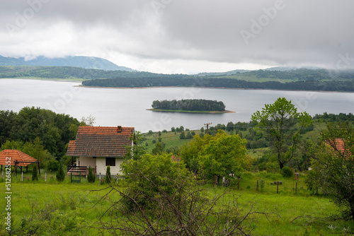 Panoramic view of Vlasina lake on cloudy day. photo