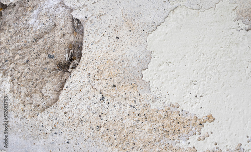 old and destroyed concrete wall with paint peeling off texture