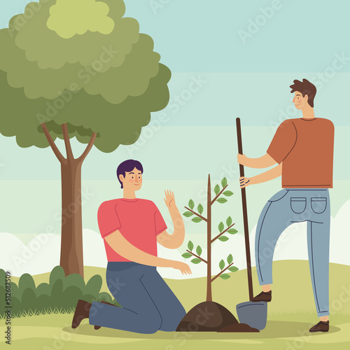 male ecologists planting tree
