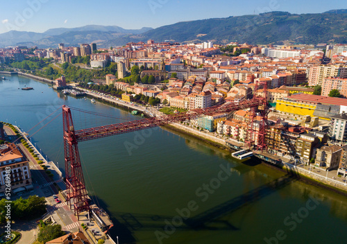 Aerial view of Vizcaya bridge over the river and cityscape at Portugalete, Spain