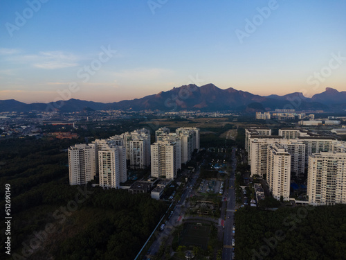 Aerial view of Jacar  pagua in Rio de Janeiro  Brazil. Residential buildings and mountains in the background. Sunny day. Sunset. Drone photo