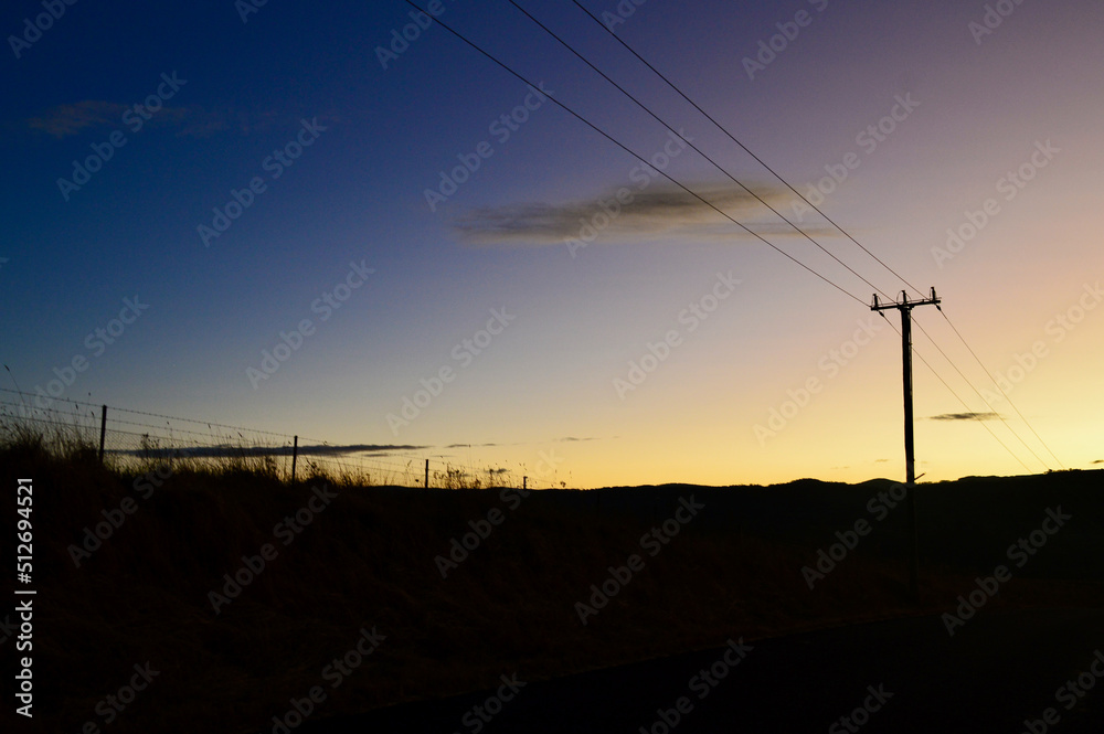 power lines in sunset