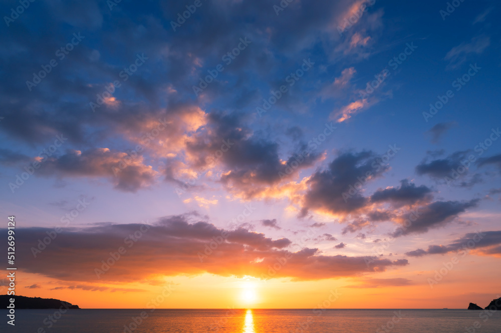 Sunset or sunrise sky clouds over sea sunlight in Phuket Thailand Amazing nature landscape seascape
